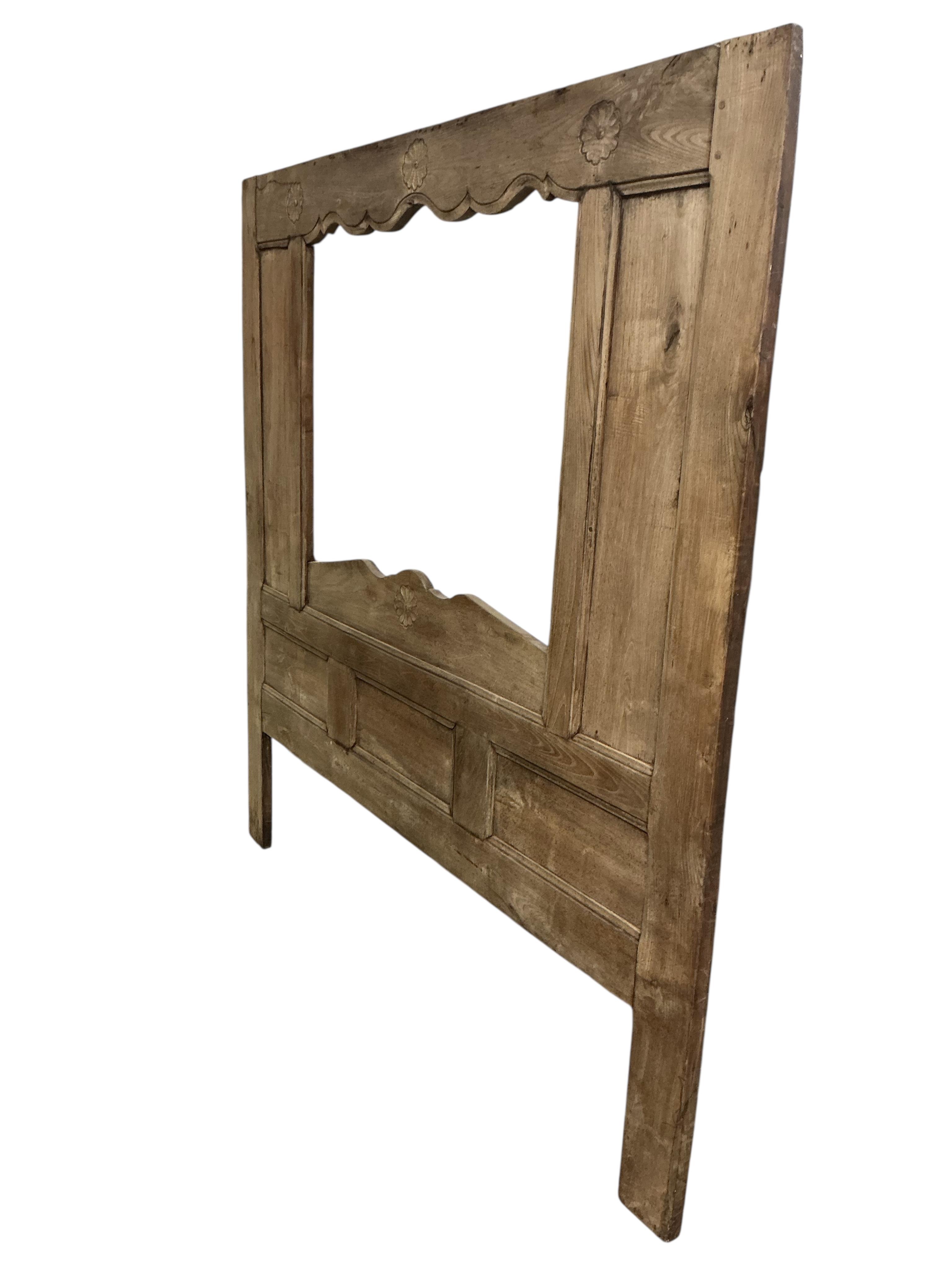 A 19th century oak truckle bed, width 178cm, height 182cm
